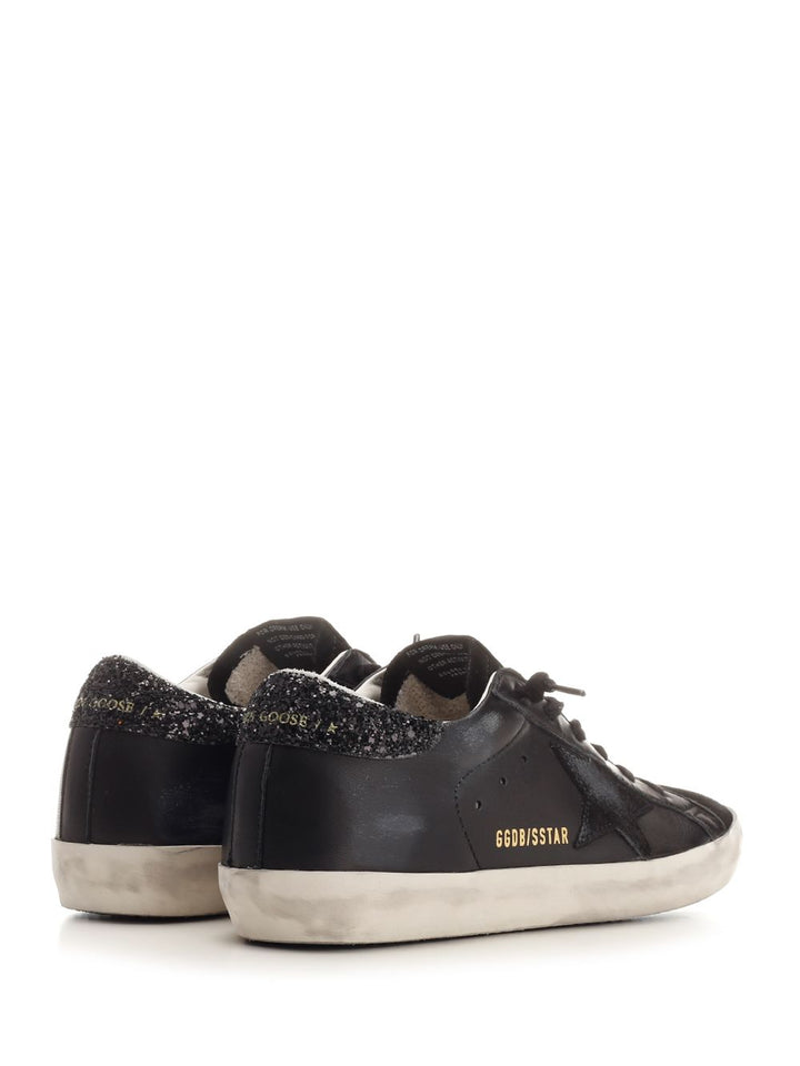 Golden Goose Deluxe Brand Super-Star Sneakers - Nero | cfccb730de3ac871b2166ace6a9d953a47e7267e