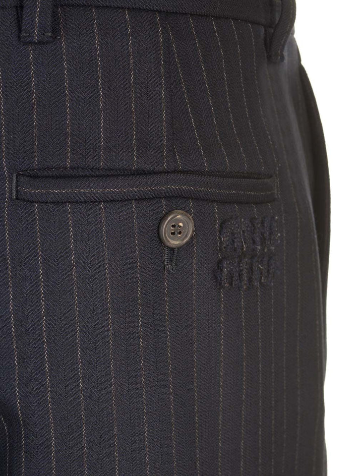 Miu Miu Blue Pinstriped Trousers - Blu | 5c8d8f75214814a0a7bd5667a5403d522ef6994e