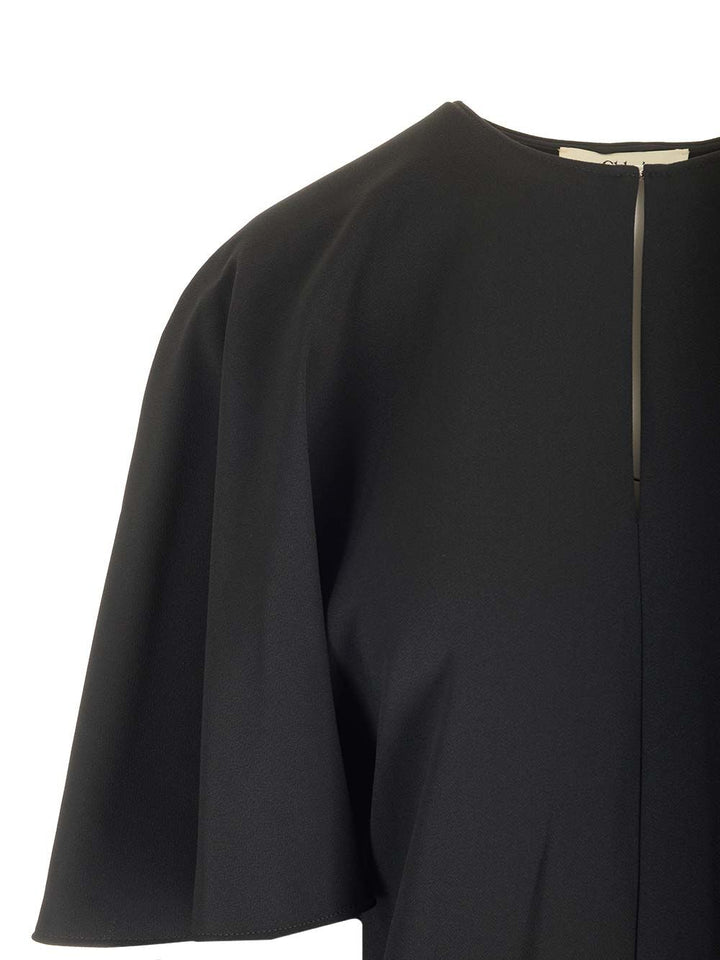 Chloe' Cape Sleeves Mini Dress Abiti - Nero | efb024ee3701f8b9168fc3a96fd87c4bbd2be159