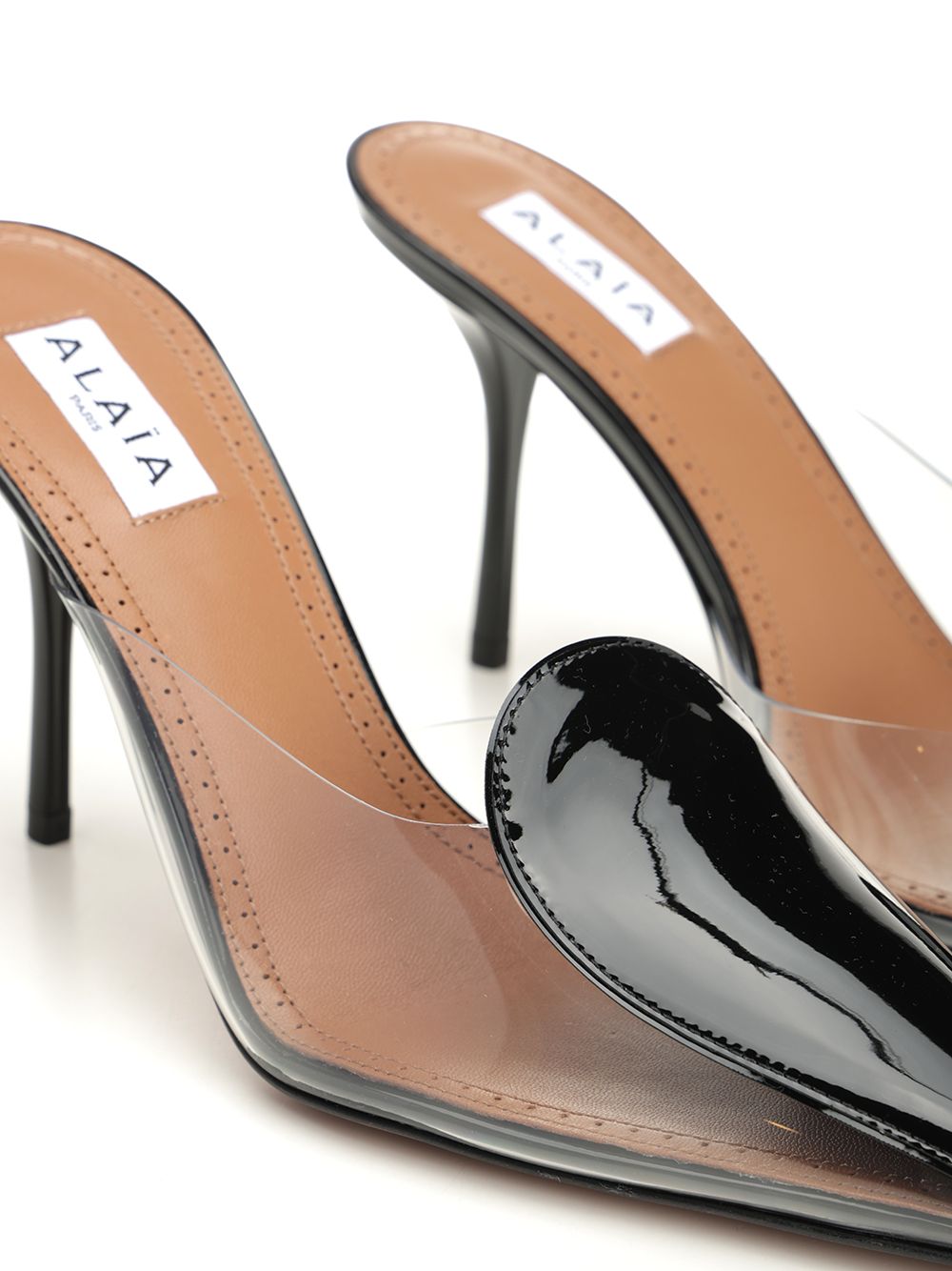 AlaÏA Mule In Patent Leather And Pvc Decollete - Nero | 4a7b886f5a24c9a82710362b903a5aafd28738ab