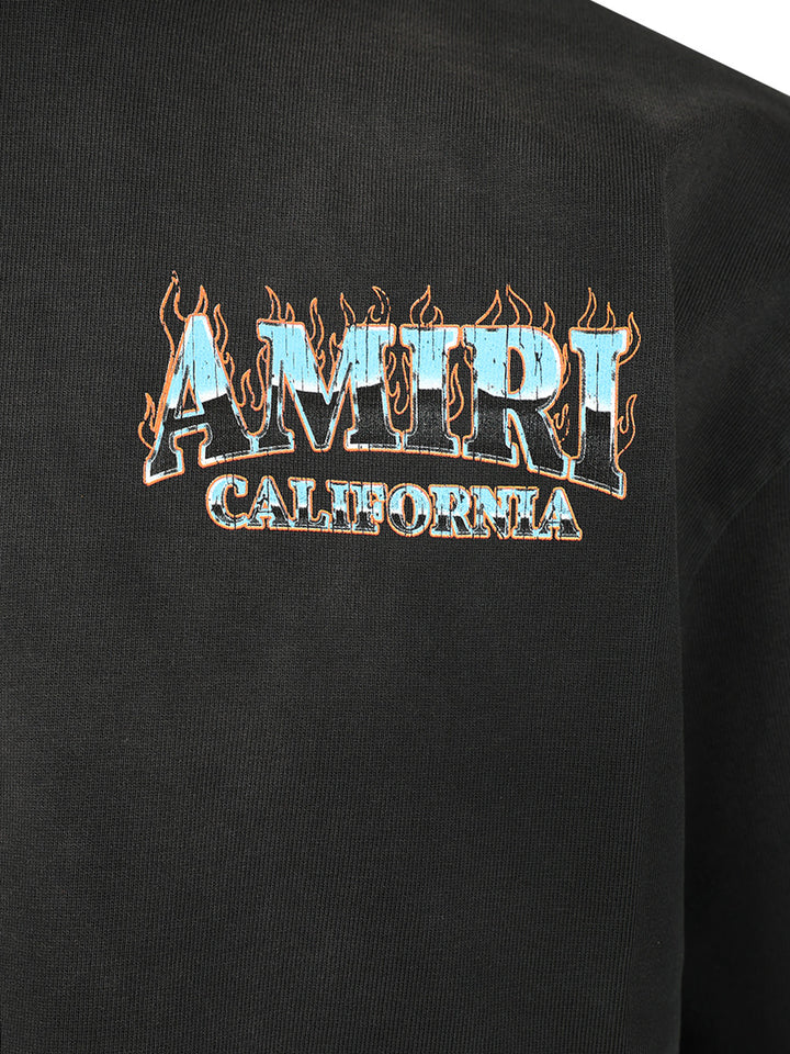 Amiri Amiri Sunny Place Oversized T-Shirt - Nero | adfc232ae3470c11a11418739944a297dd55acae