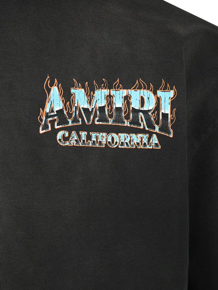 Amiri Amiri Sunny Place Oversized T-Shirt - Nero | db866064e9dbc9c3cdcf473eb2c58c465cb31885