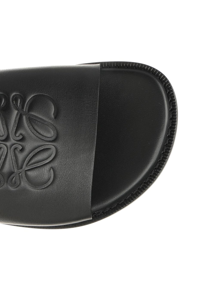 Loewe Anagram Flex Slide Scarpe basse - Nero | c31106e636250bc39c81ba3c833a16555087e195