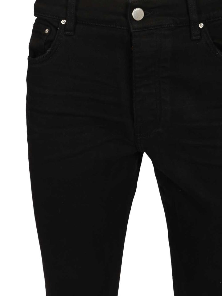 Amiri Stack Jeans - Nero | 36d8381a868cd2bad48fd5f4cdb80b38376124d8