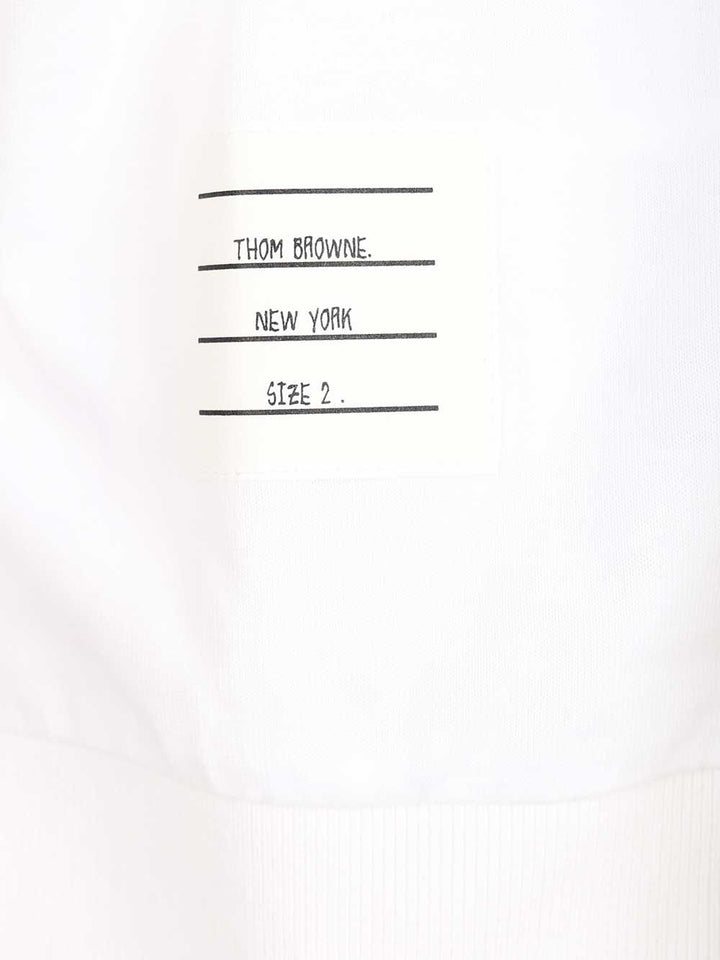 Thom Browne Garment Dyed Short Sleeve Rib Cuff Tee In Med Weight Jersey W/ Overdyed 4 Bar T-Shirt - Bianco | 15828579c47ca174ed58f4e41f01e53bebc23253