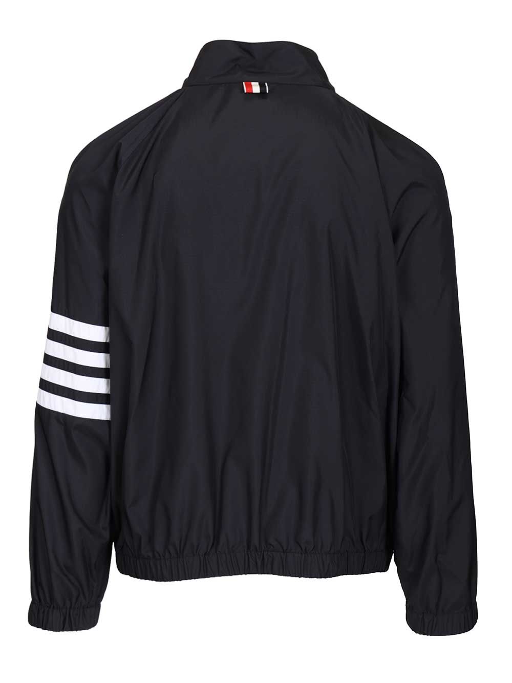 Thom Browne Zip Front Raglan Track Jacket W/ 4 Bar In Shiny Ripstop Giacche - Blu | 7db01d26be173fb5796665e9baa51a7785c6fd9e