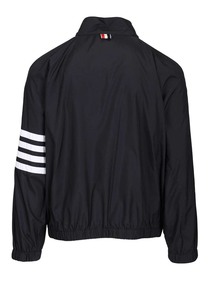 Thom Browne Zip Front Raglan Track Jacket W/ 4 Bar In Shiny Ripstop Giacche - Blu | 7db01d26be173fb5796665e9baa51a7785c6fd9e