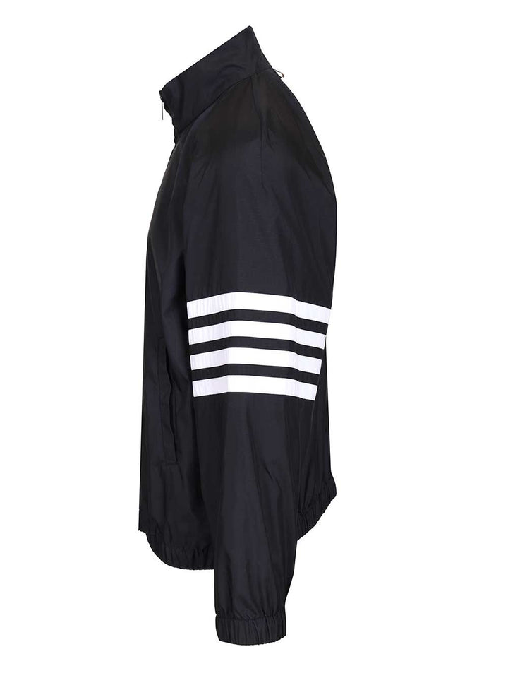 Thom Browne Zip Front Raglan Track Jacket W/ 4 Bar In Shiny Ripstop Giacche - Blu | 79ccc78dd9afb55d9f98d7e4ba363ef3462803c9