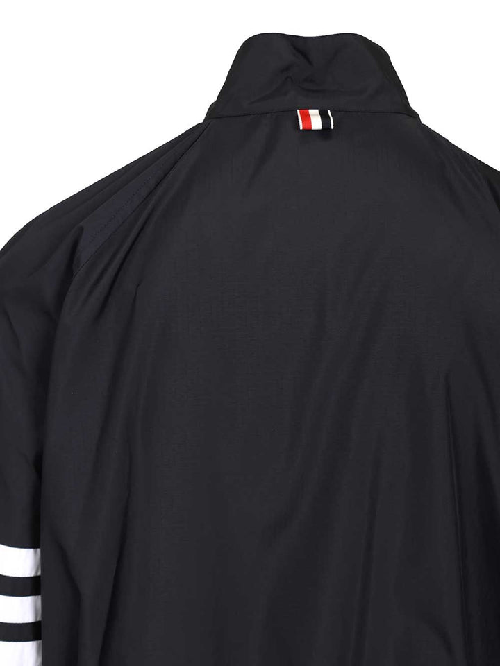 Thom Browne Zip Front Raglan Track Jacket W/ 4 Bar In Shiny Ripstop Giacche - Blu | e319a8750270a9e595d63cc08d6e2eff383d47b3