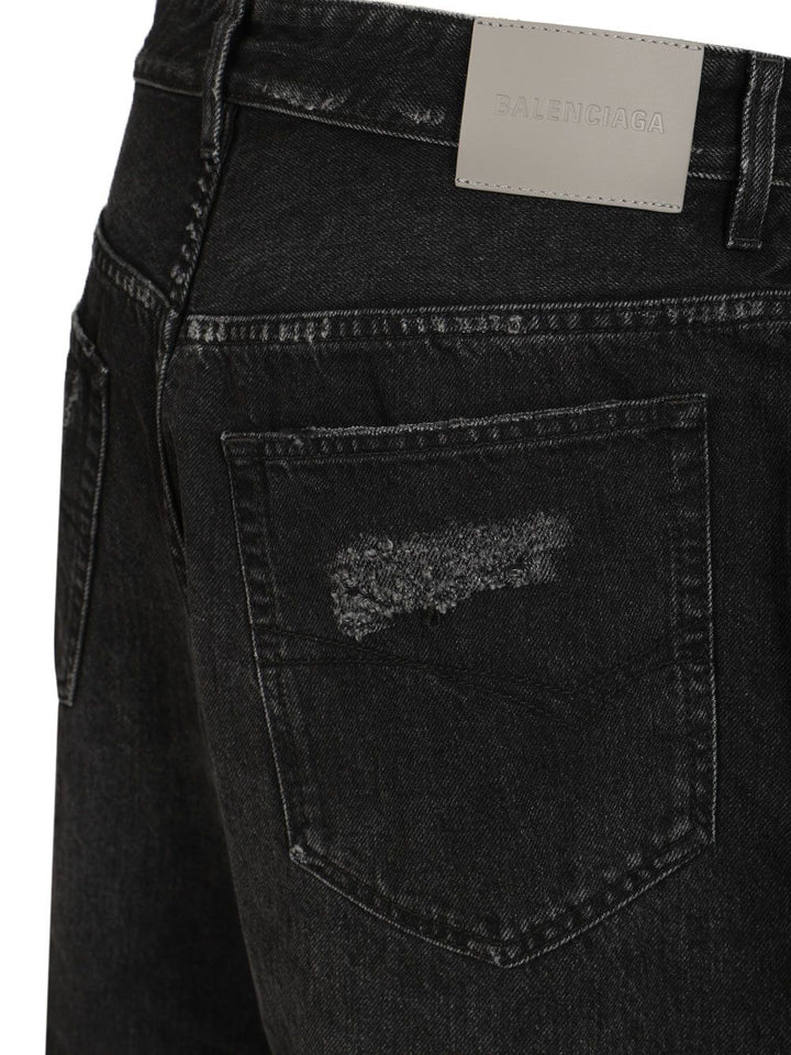 Balenciaga Curved-Leg Jeans - Nero | 19904b6f08f270ceaea644ff3ca313a618ee308d