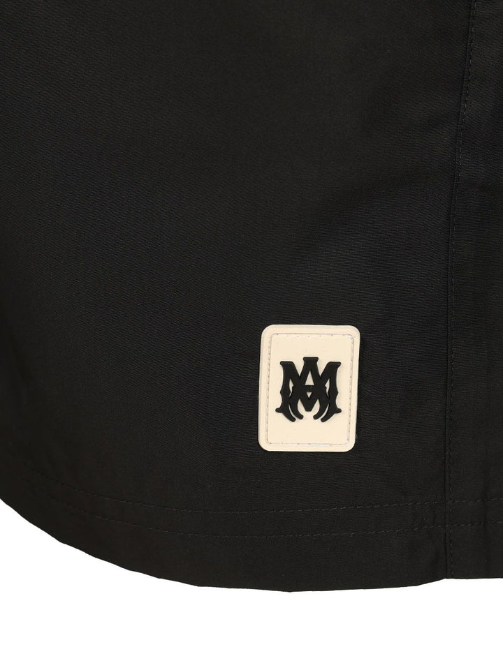 Amiri Amiri Swim Shorts Swimwear - Nero | 013b8148313ee3fb42780e509a0f3edb52f3f710