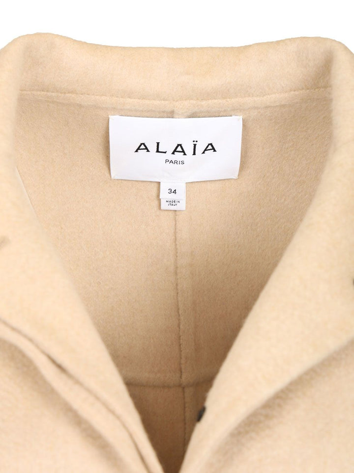 AlaÏA Asymmetrical Coat Knitwear - Beige | d427fc7cf0b84f52616127f675c8b052dfba7316