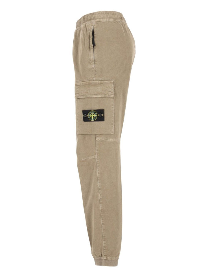 Stone Island Vintage-Effect Stretch Trousers - Verde | 3510c38db6a5d852d29edbd79831e35758175419