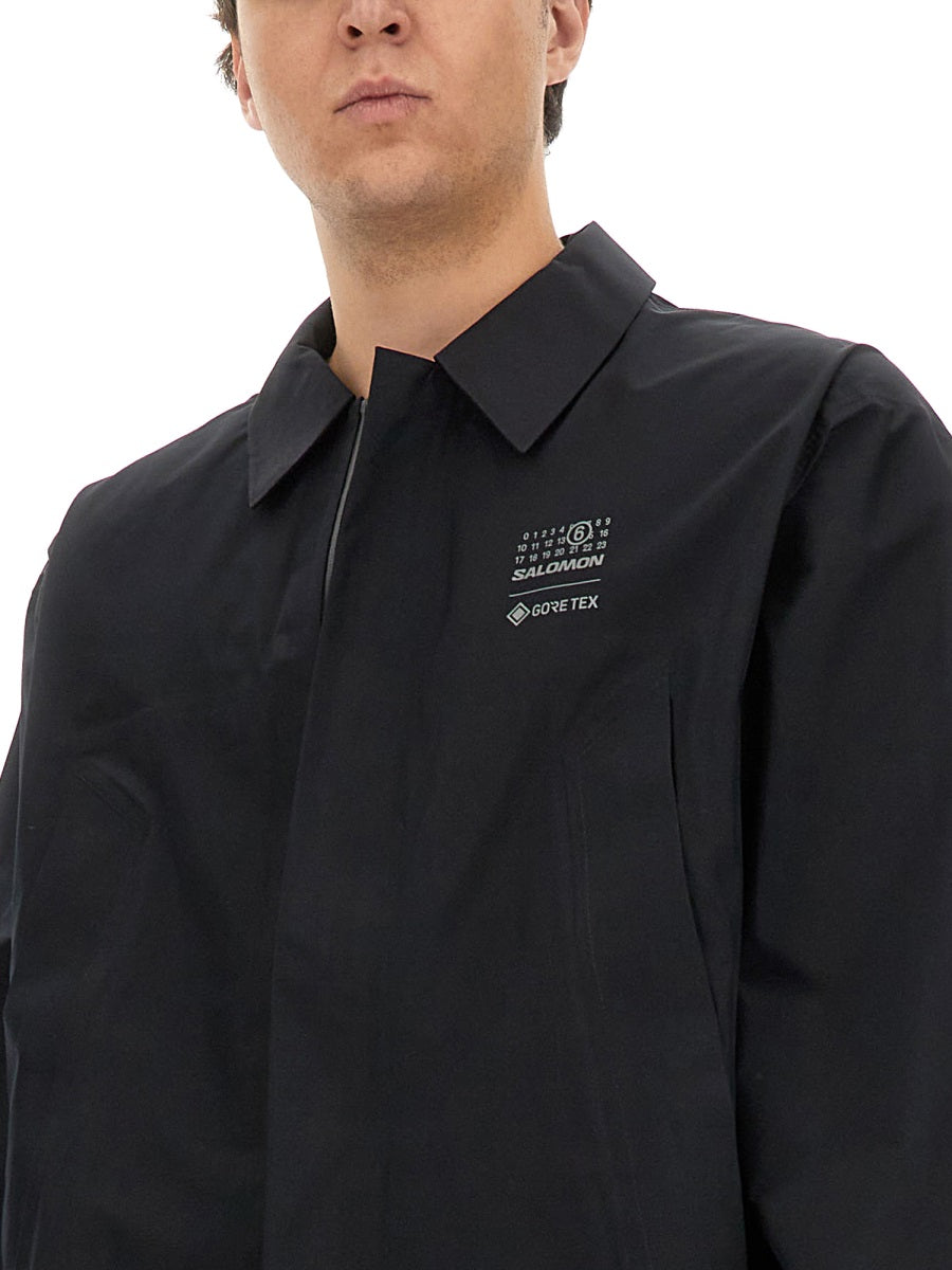 MM6 x Salomon Trench e Impermeabili - Nero | Wanan Luxury