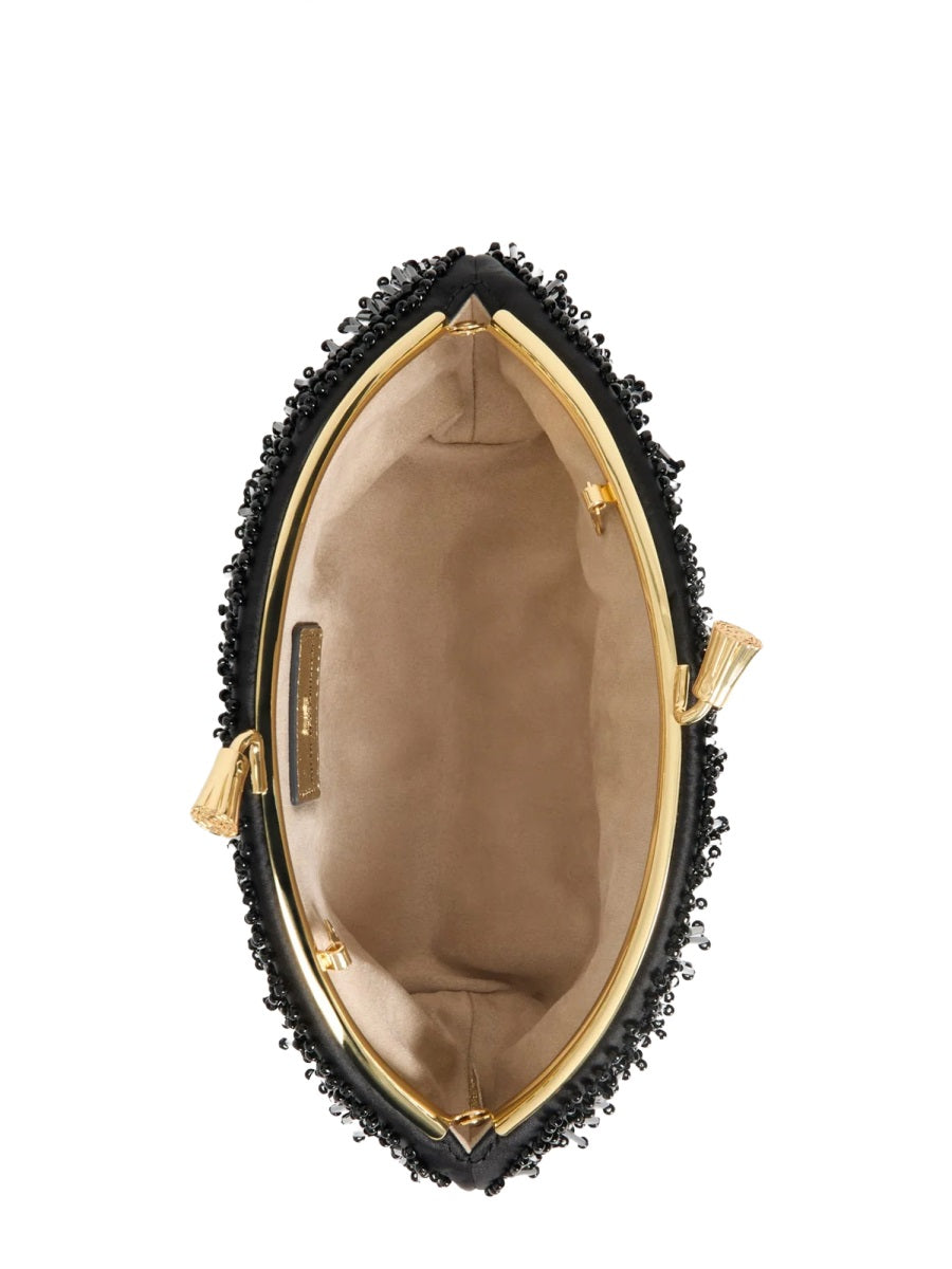 Anya Hindmarch Pochette - Black | d9ea2876a13a98f7f7c68b37f4d2e93c85d58aeb