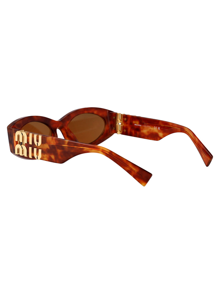 Miu Miu SUNGLASSES - Marrone | 27adb332e019c70f14c033ae4d2b048287cd4d64