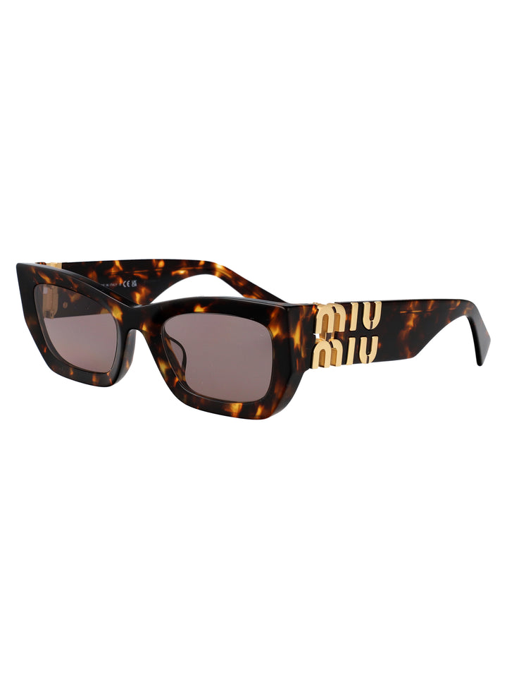 Miu Miu SUNGLASSES - Marrone | f035ceb5797a839de53ba736b4978d273dda6c46