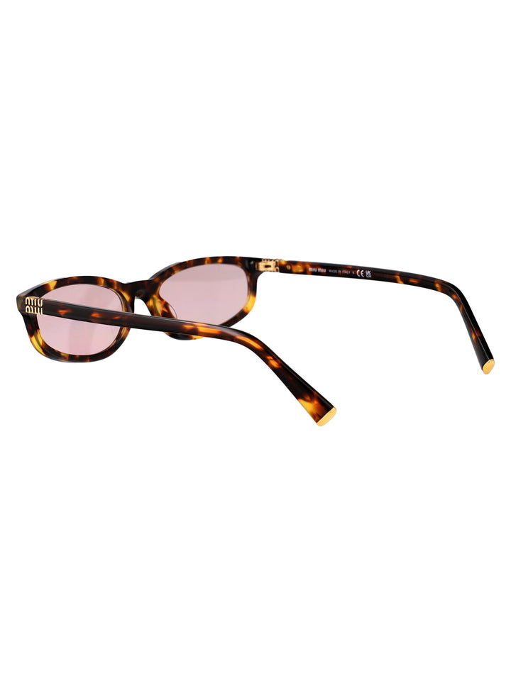 Miu Miu SUNGLASSES - Marrone | d89c364026b013ed2ca2f393216263aa396f9266