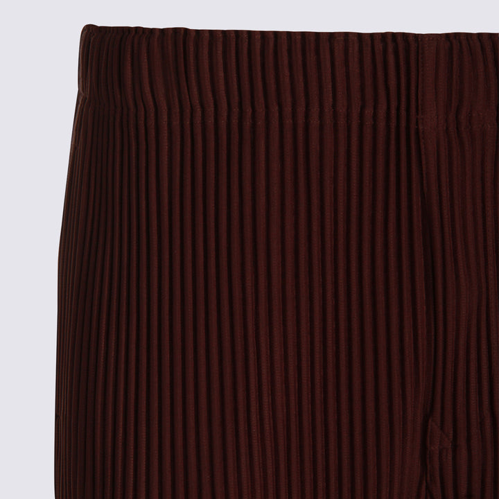 Homme Plisse Issey Miyake Trousers - Marrone | d7b6ff860b05703524affca69abe45c584c6ffc1