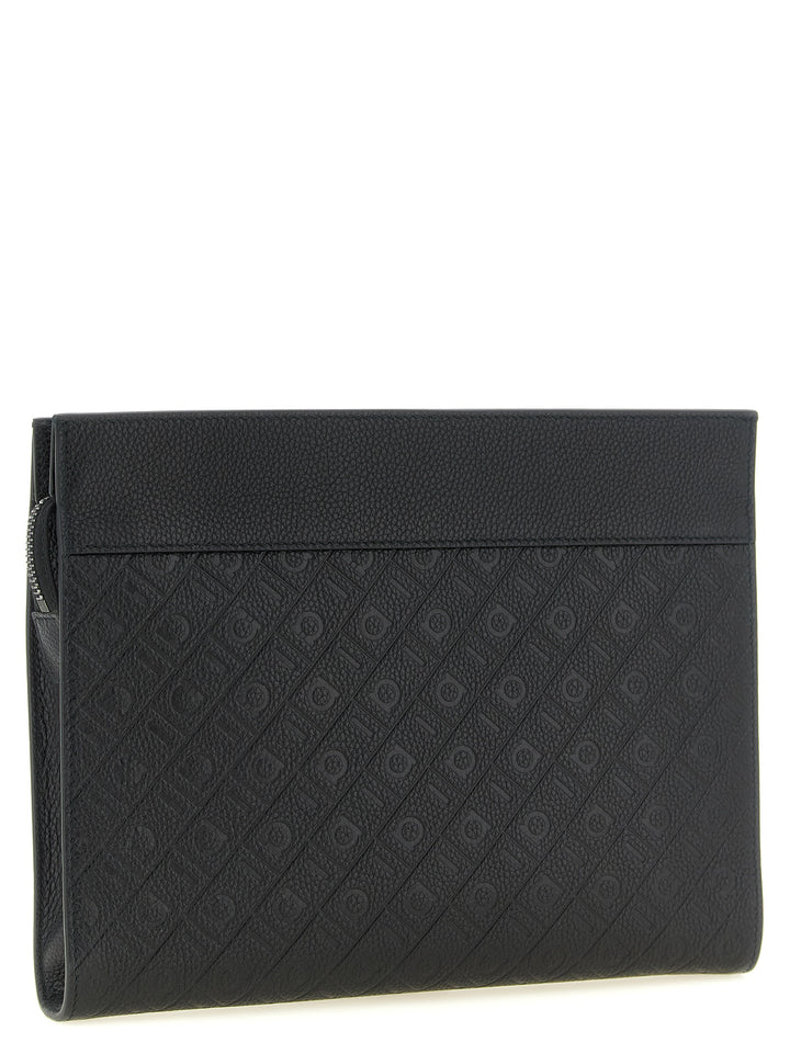 Ferragamo Ferragamo Monogram Clutch - Nero | 14797b1c2a70a4896aa4c58068876696b1639cc5