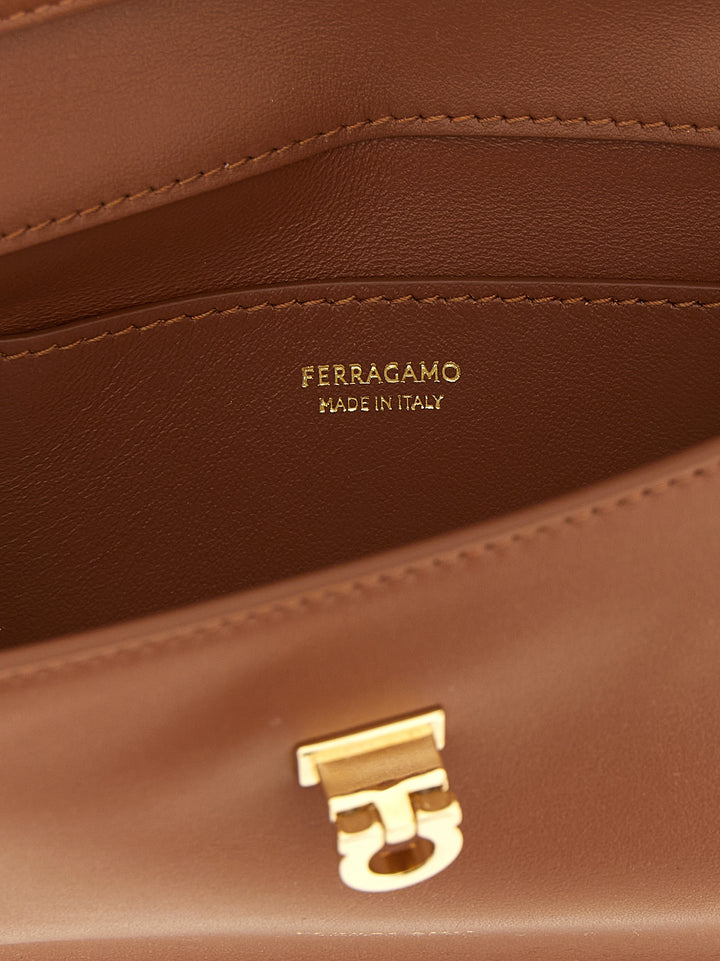 Ferragamo Harley Clutch - Marrone | 0057ba68879474618c70efeedfdad640c3a4b92d