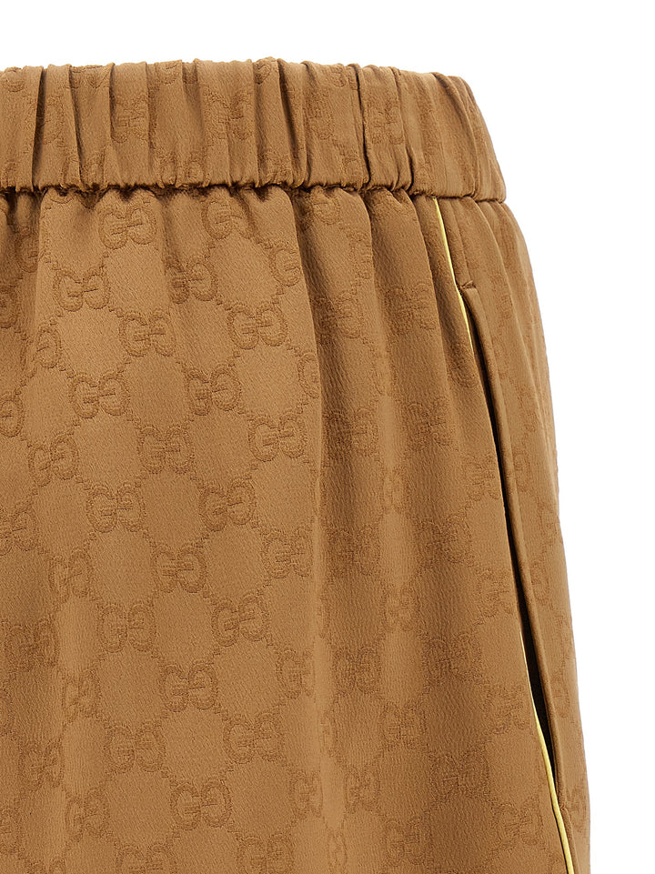 Gucci Satin Shorts Gg Bermuda e Short - Marrone | 64411ba63506d6b12b4723ed4d815dbcd23aa4a4