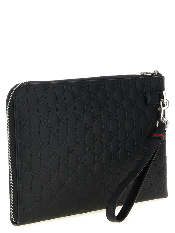 Gucci Gg Emblem Clutch - Nero | 81830ca8952271cc41a1624ca1efb98f79cf83c6