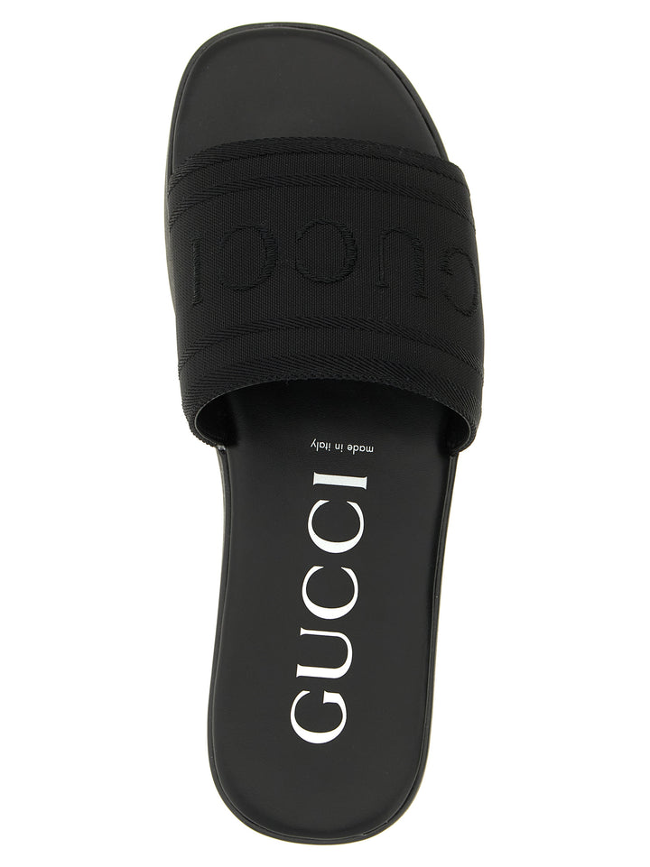 Gucci Jacquard Logo Slides Sandali - Nero | bf9b54685b9ec619c9ad5c0c192efe92184dcbfe