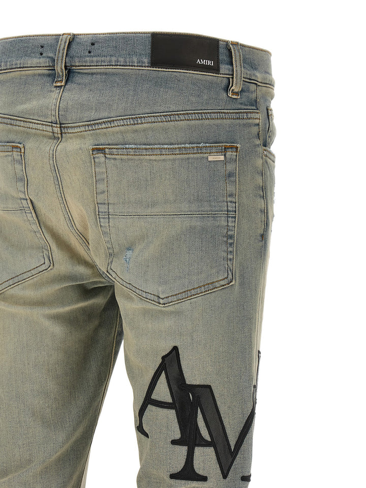Amiri Staggered Logo Jeans - Celeste | c55997b78139b5586824df629a6578a48e145434