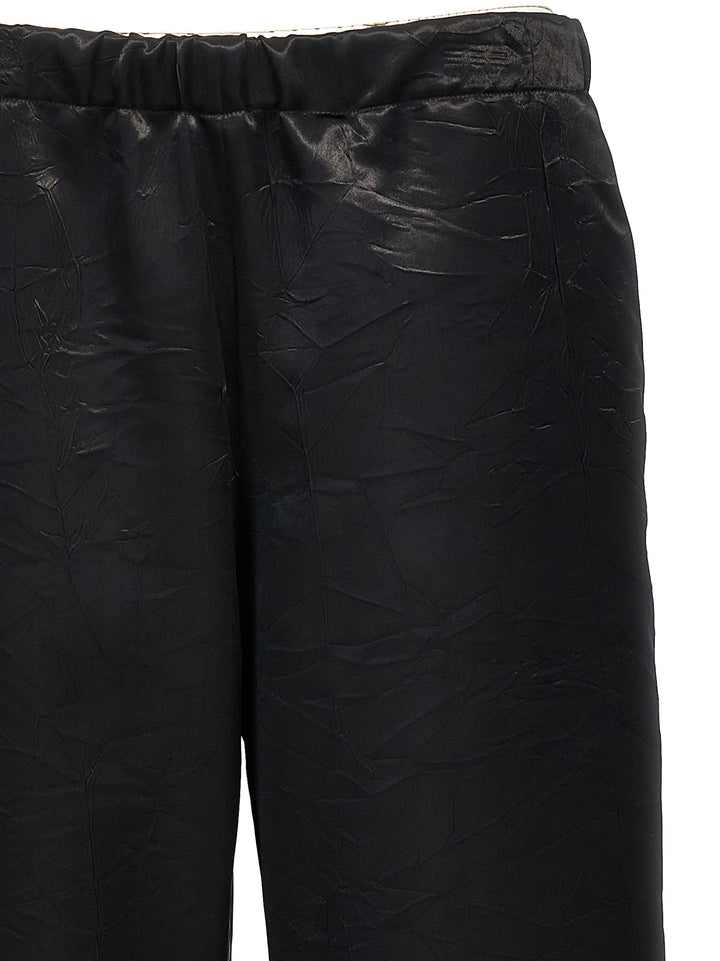 Givenchy Shiny Pantaloni - Nero | edbf03f891a91b1e840353dc0c19c21636af044d