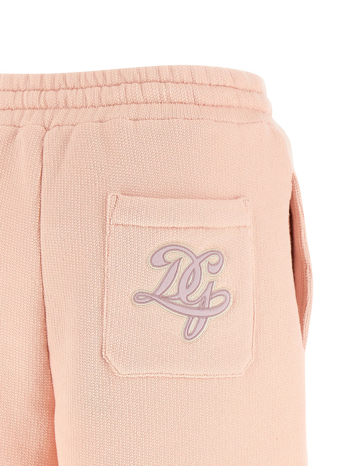Dolce & Gabbana Logo Patch Shorts Bermuda e Short - Rosa | 5d20f9b2057fd8045831bb833624cbf6222c7894