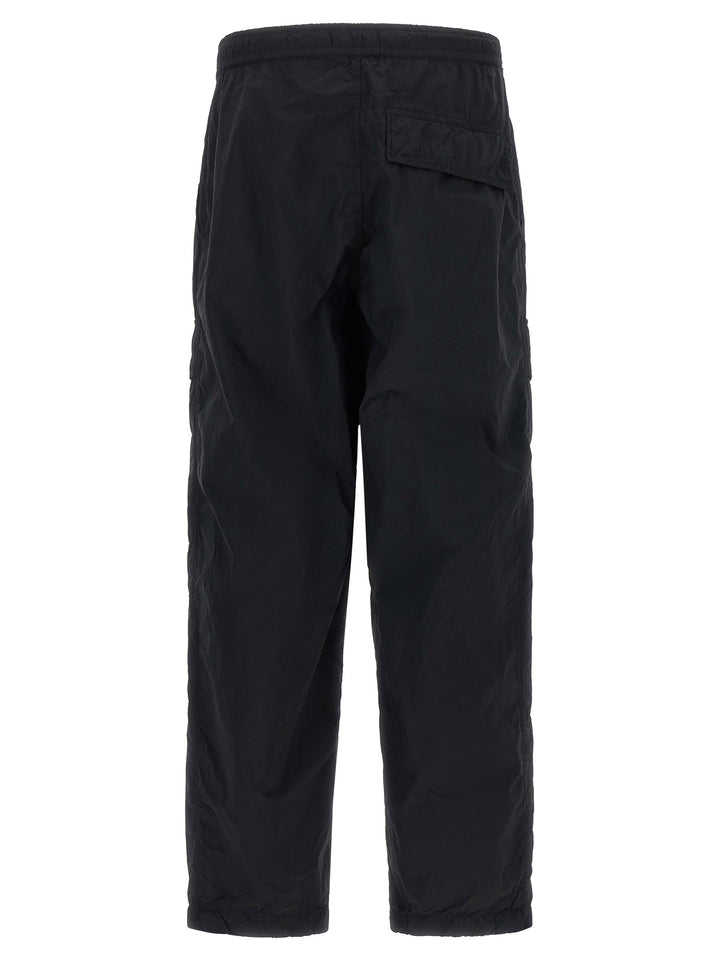 Stone Island Badge Stone Island Ghost Pantaloni - Nero | bde3211b9d7acda946c5e1cac99be833cb95d47b