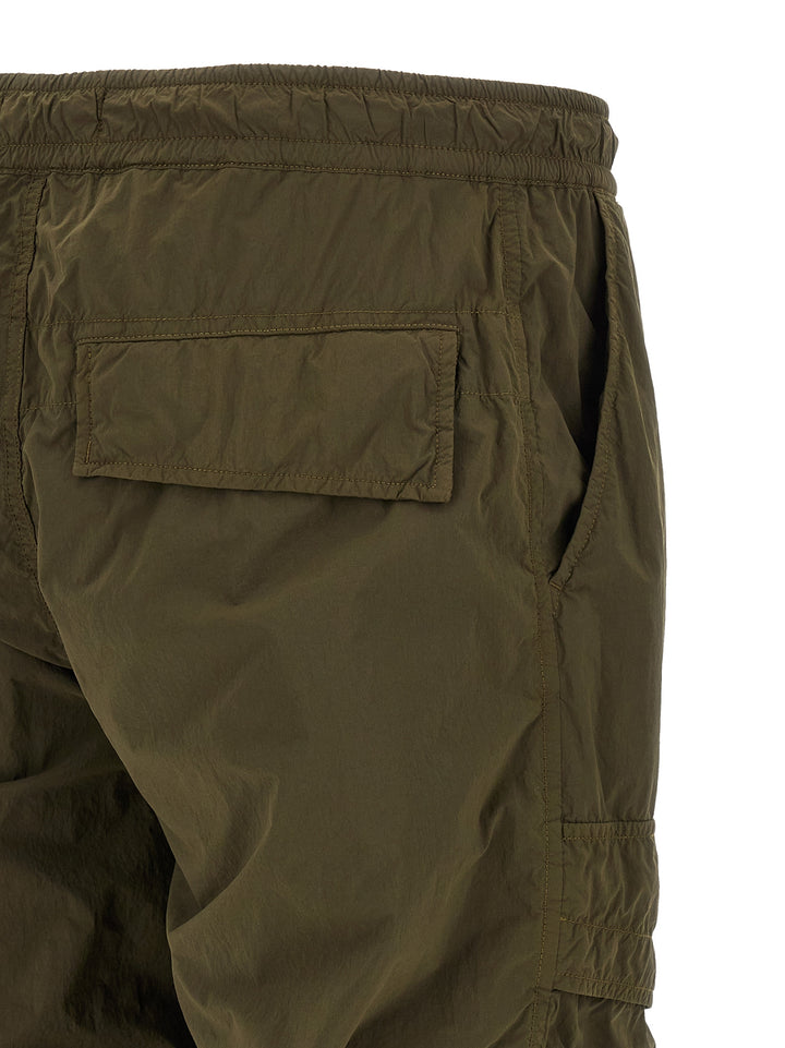 Stone Island Badge Stone Island Ghost Pantaloni - Verde | 0d3eaa396dbd83fa1cf9fe4380aed96cb39d3e42
