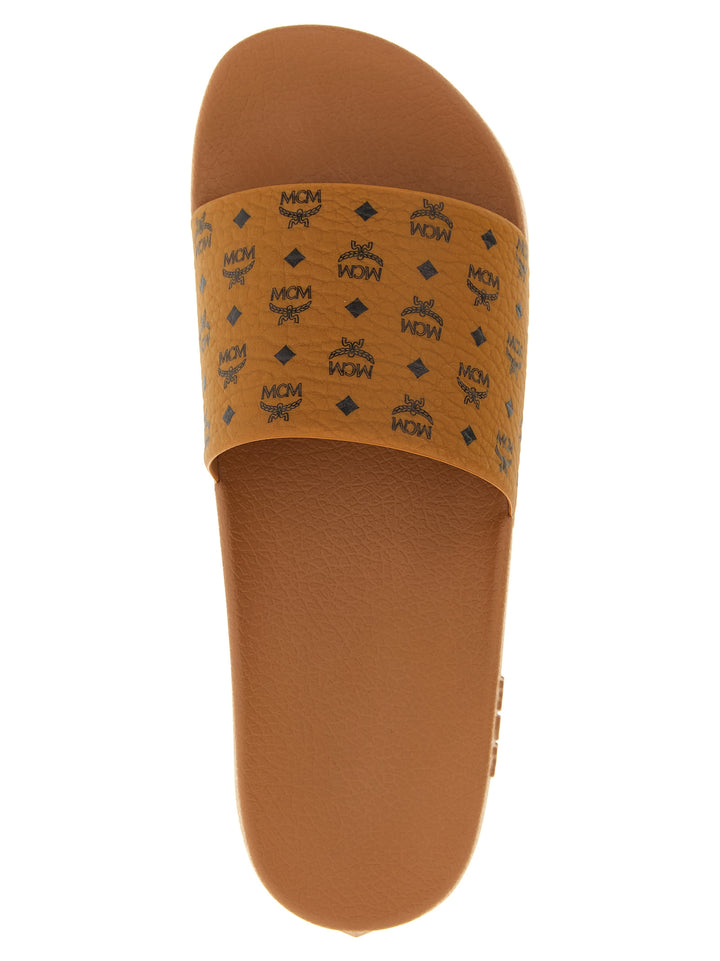 Mcm All-Over Monogram Slides Sandali - Marrone | be35230a6ea71fcda03ad7843d2d1dce83362574