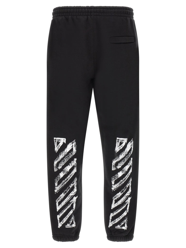 Off-White Motion Arrow Cuffed Pantaloni - Nero | 946c6c0ba08e6c08632d9f2321f6782b29f29a26
