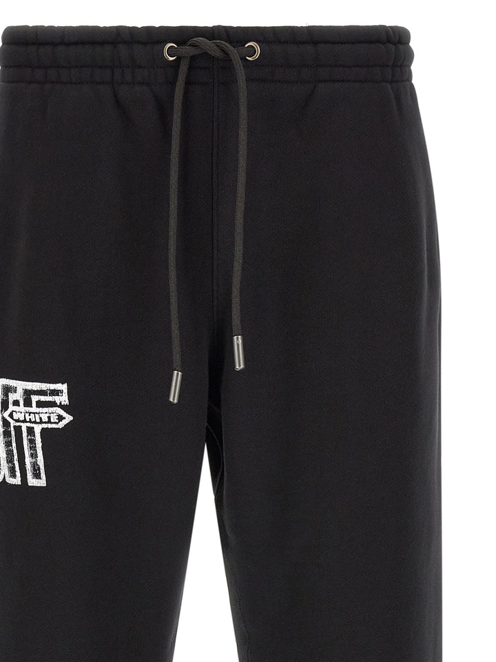 Off-White Motion Arrow Cuffed Pantaloni - Nero | 6b9136b166b5f675e23b9d765fbd323e9a4a9a11
