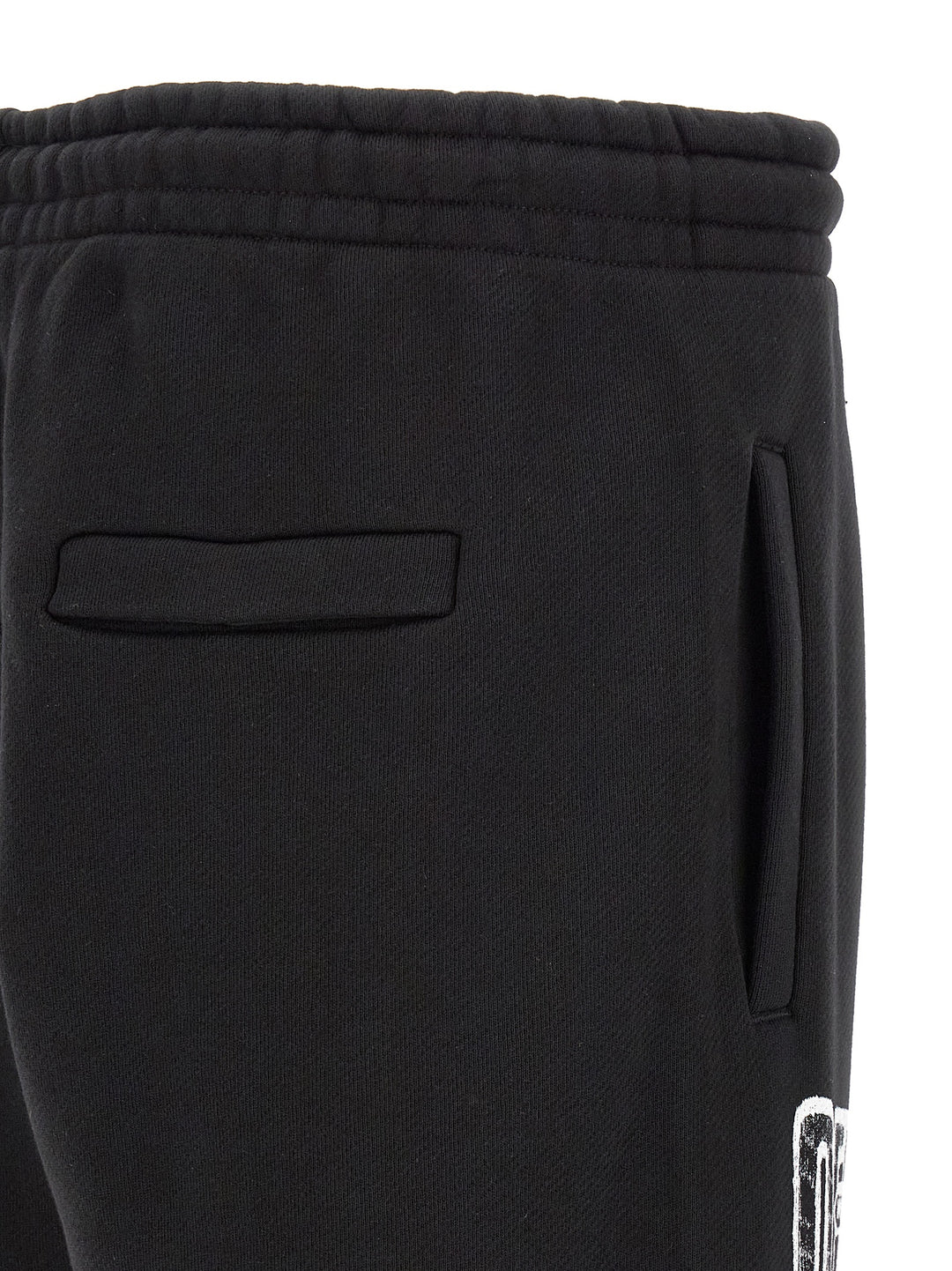 Off-White Motion Arrow Cuffed Pantaloni - Nero | 03c273ff37d70a0c50379c8fc14e27a093cb234c