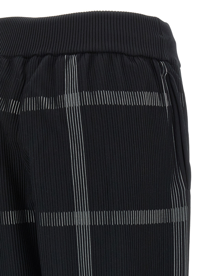 Pleats Please Issey Miyake Crossing Knit Pantaloni - Nero | 41c93229256f5e90ae0357406da1a09f42817721