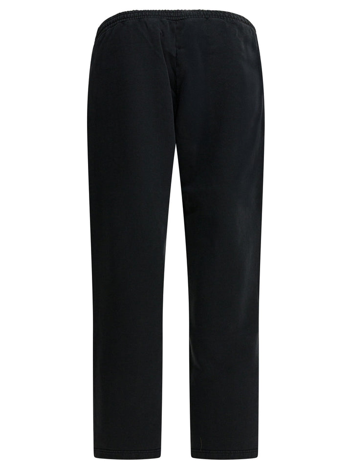 Balenciaga Baggy Cursive Trousers - Nero | 399368e789b76bfb22c429ff0cb3954a6de85d0c