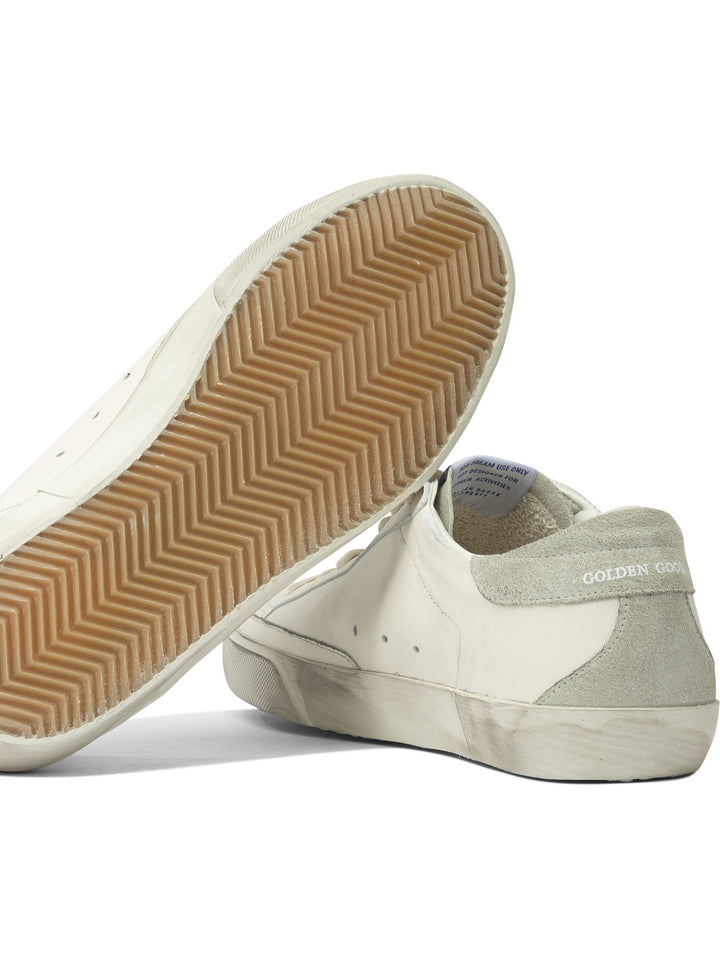 Golden Goose Super-Star Sneakers & Slip-On - Bianco | 3d72571c4113fe02e3345f950c4b422a16a34968