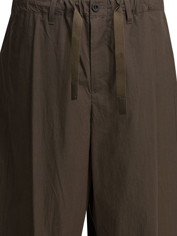 Sacai Typewriter Trousers - Marrone | e172c5b4eff615bfc4ecb3520458df3c525c2e89