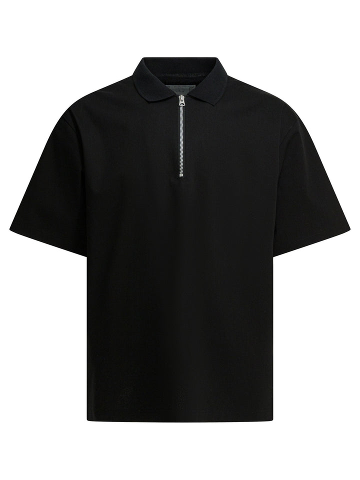 Sacai Short-Sleeved Polo Shirt With Zipper Polo shirts - Nero | 63a3224eb7942c16d3503893ebb73550bd1efee5