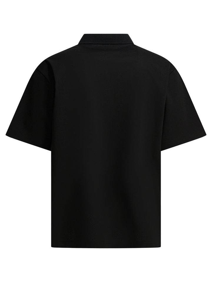 Sacai Short-Sleeved Polo Shirt With Zipper Polo shirts - Nero | c7794ecb1303198ba18f2cfe0b65587bc395c866