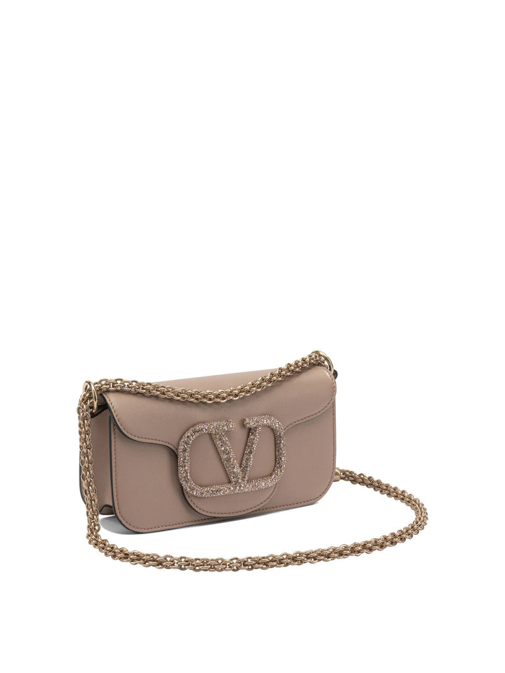 Valentino Garavani Locò Leather Small Handbag Handbags - Rosa | 3acb2492c936a91295fb1c6488940ca825e8344f