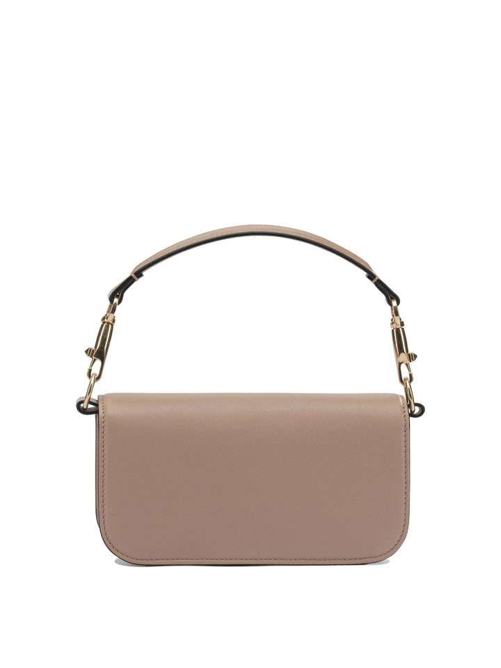 Valentino Garavani Locò Leather Small Handbag Handbags - Rosa | 0f39d868c343928d4e927b7107e571edbe9513f0