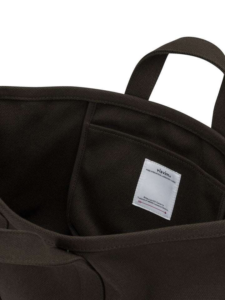 Visvim Canvas Rime Tote M Handbags - Marrone | c01bd6a36dc627411ce941fe87c8f77133f29873