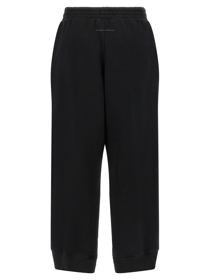 Mm6 Maison Margiela Split Joggers Pantaloni - Nero | 0294acb0bcd1fb0a902554ce09d22b44437a7204