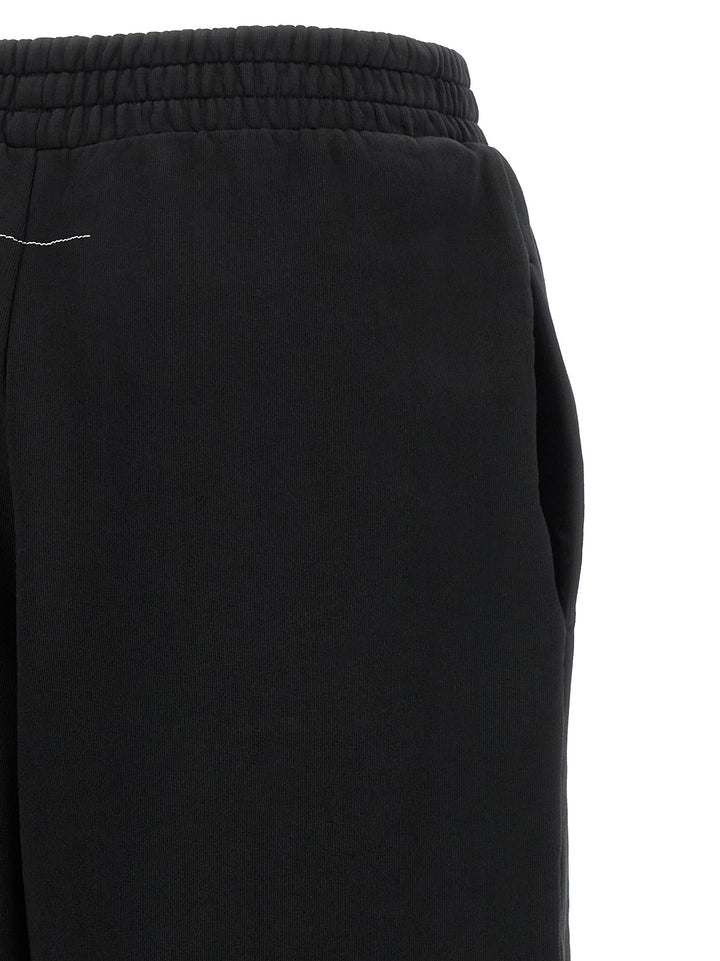 Mm6 Maison Margiela Split Joggers Pantaloni - Nero | 4a15733a4bba44e06786415faea05ec0964c8545