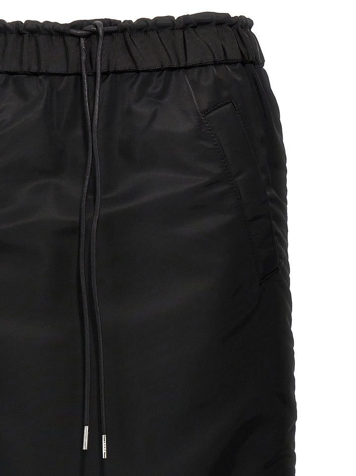 Sacai Pleated Insert Skirt Gonne - Nero | e8f5d366fdd9aa27d1dc413fc832020b45cce03d
