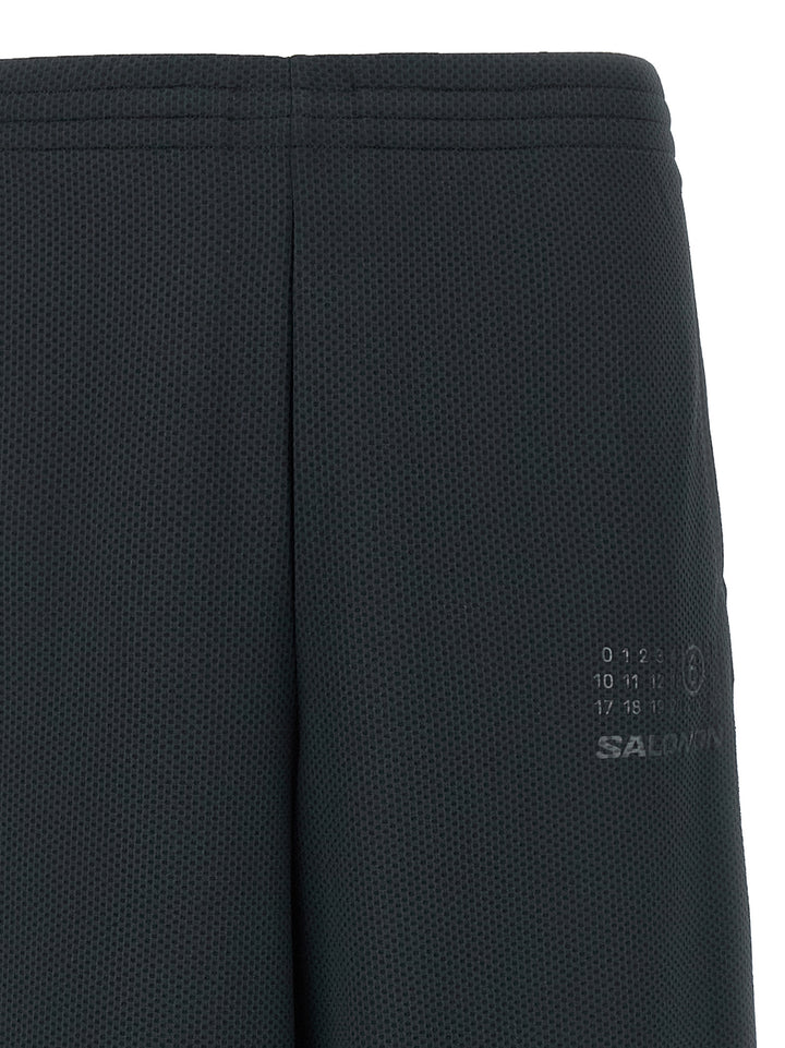 Mm6 Maison Margiela Capsule Mm6 Maison Margiela X Salomon Joggers Pantaloni - Nero | 9a6e51338f77eacb398a4c43875673d22266f3b2